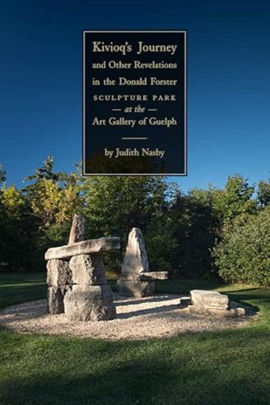 Stone sculpture in a park with trees and a clear blue sky, featuring text about a sculpture park.