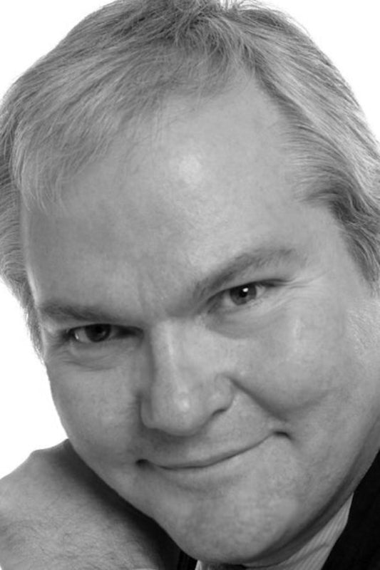 Black and white portrait of a person with a neutral expression