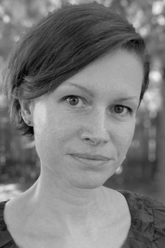 Black and white portrait of a woman with short hair.