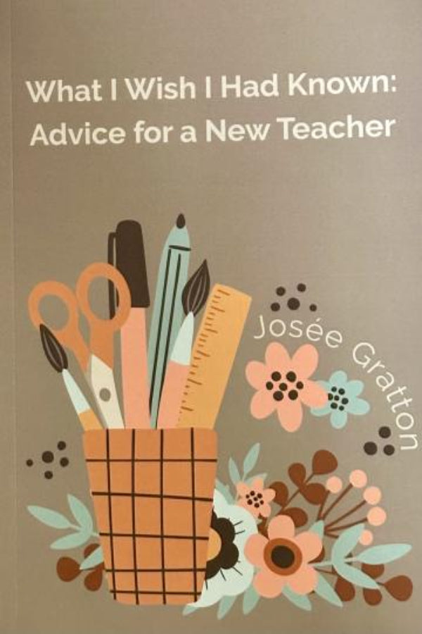 Book cover with stationery items and flowers on a brown background
